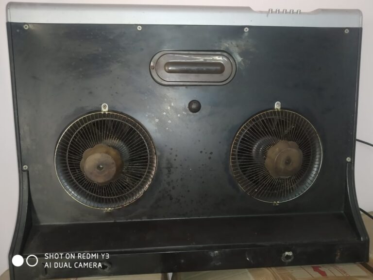 Services 1 Kitchen chimney blower fans with heavy grease build-up before cleaning